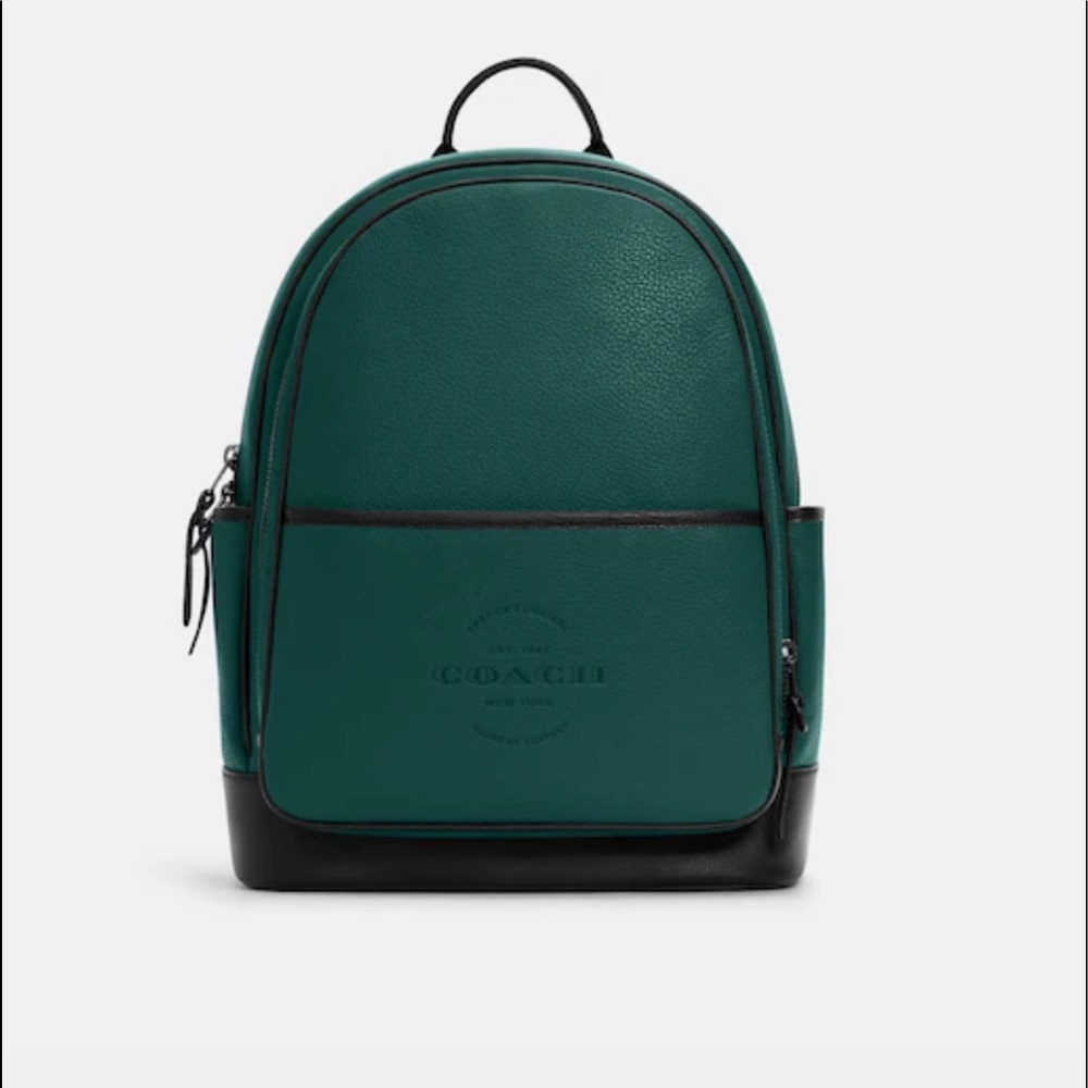 Coach Thompson backpack.Only used once and stored well in it's original bag.
